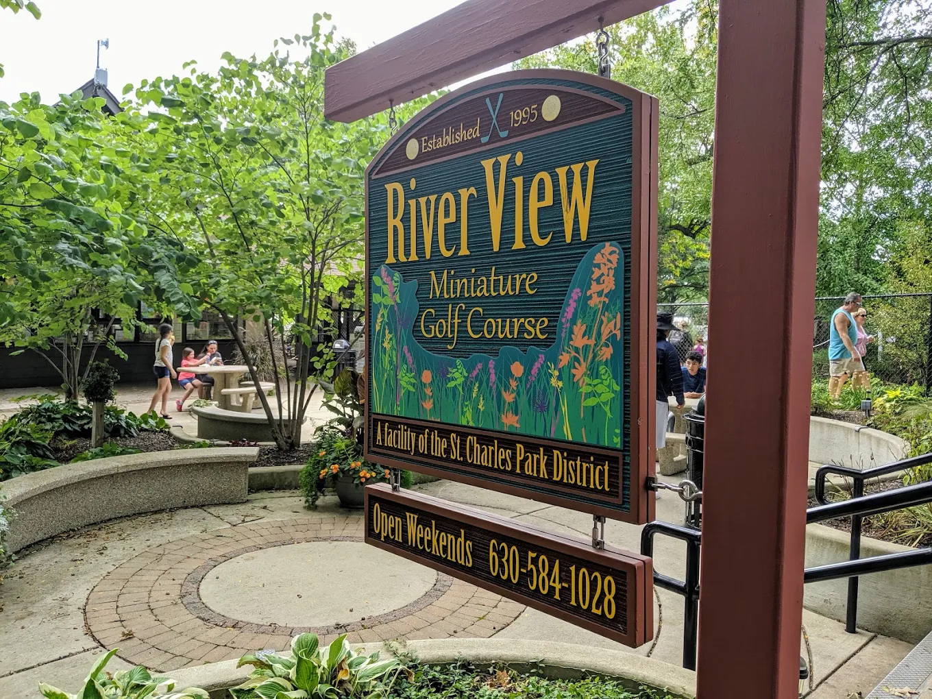 River View Miniature Golf Course, Established 1995 — hand-painted sign